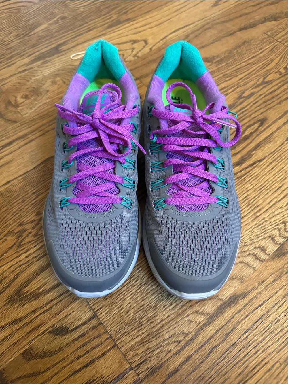 EUC Nike Women’s Gray Sneakers with Purple Laces and Teal Accents; 7.5